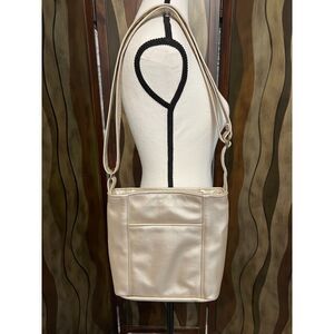 The Purse Peddlers Emily metallic light gold leather crossbody bag